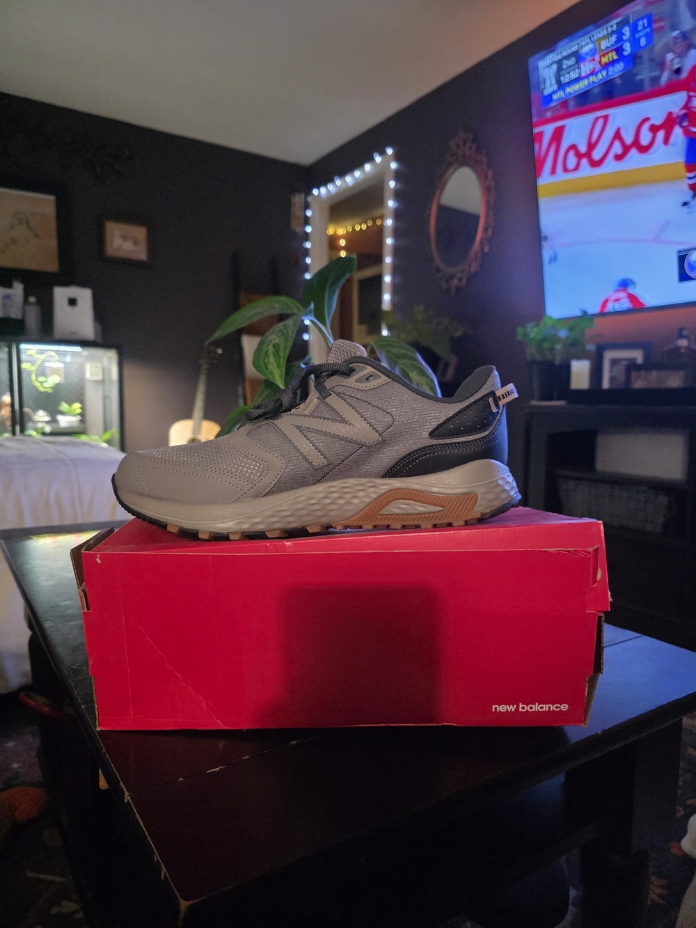 New Balance Men's Gray and Black Athletic Sneaker with Brown Accent